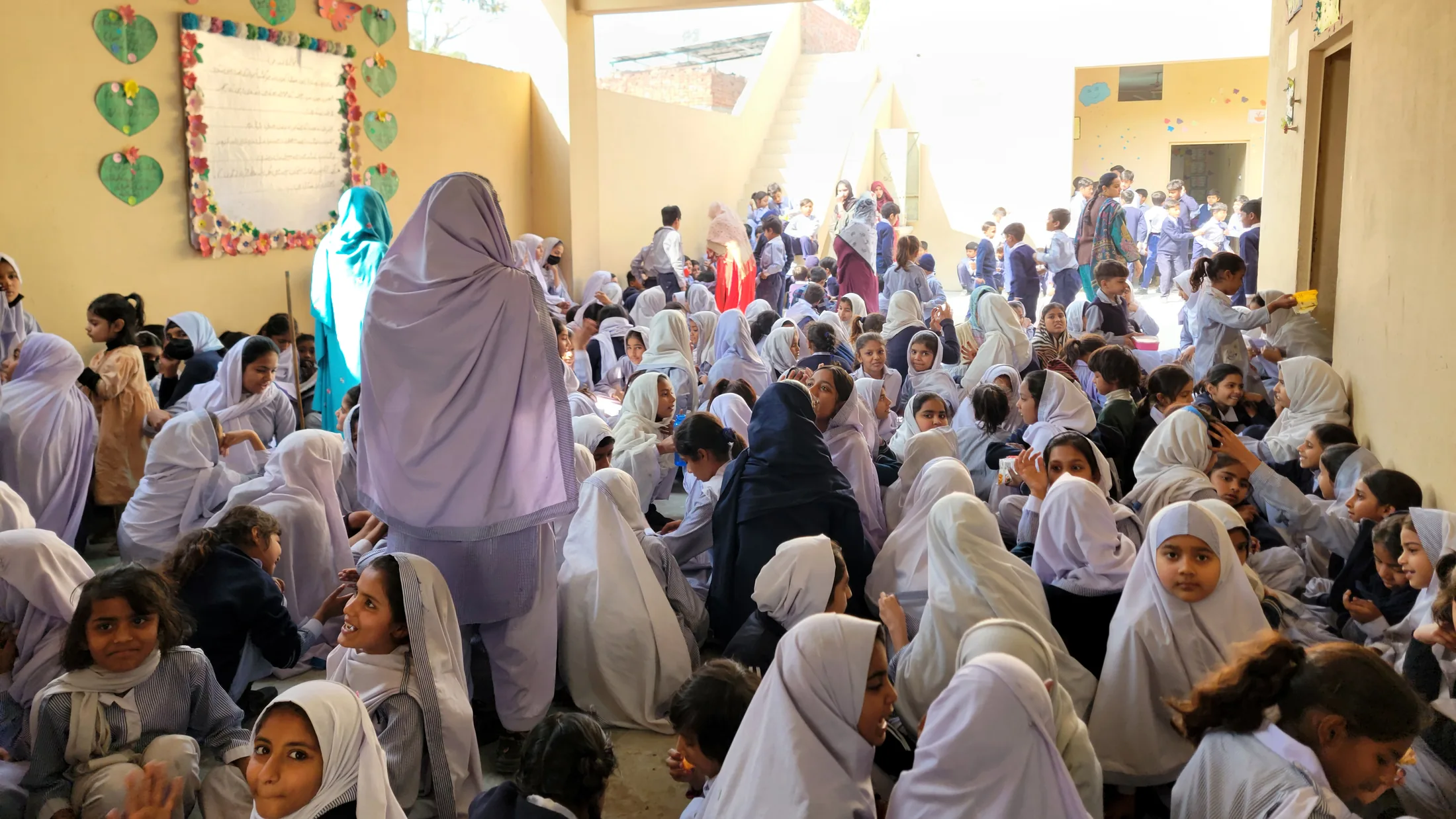Students gathered in the covered hall