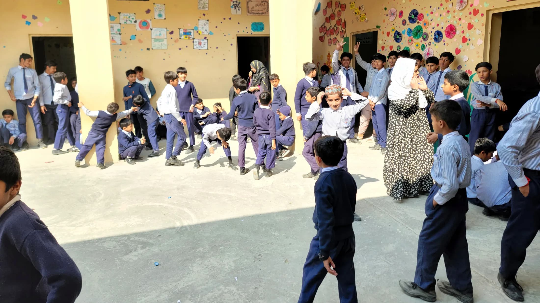 Students taking part in a courtyard activity